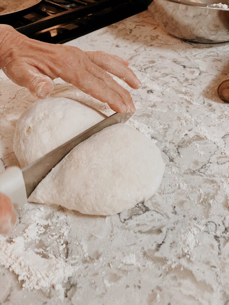 Dividing sourdough tortilla dough