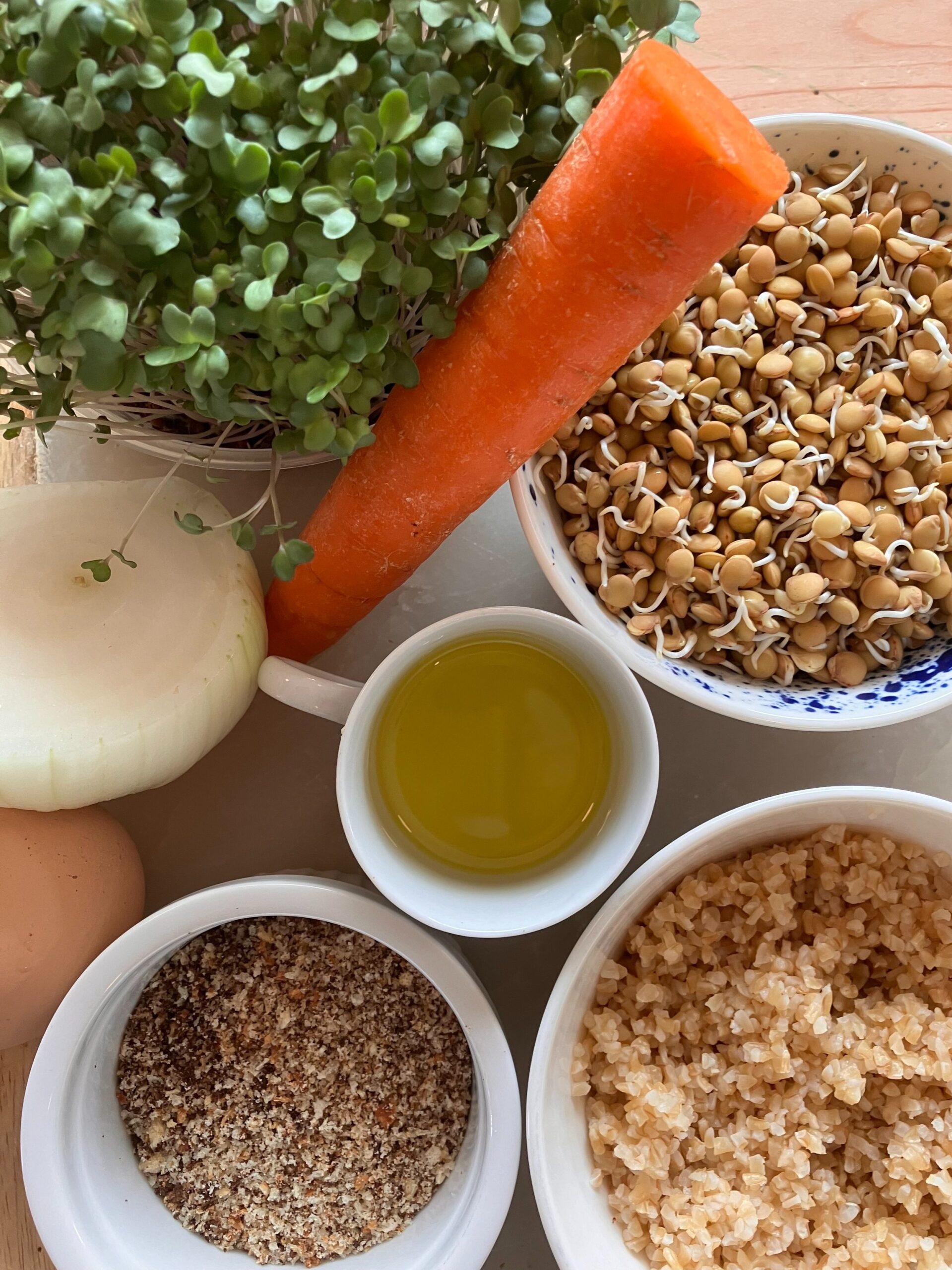 Bulger, bread crumbs, olive oil, egg, carrot, onion, sprouted lentils, microgreens