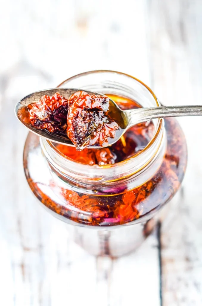 Oven dried tomatoes in olive oil (photo larderlove)